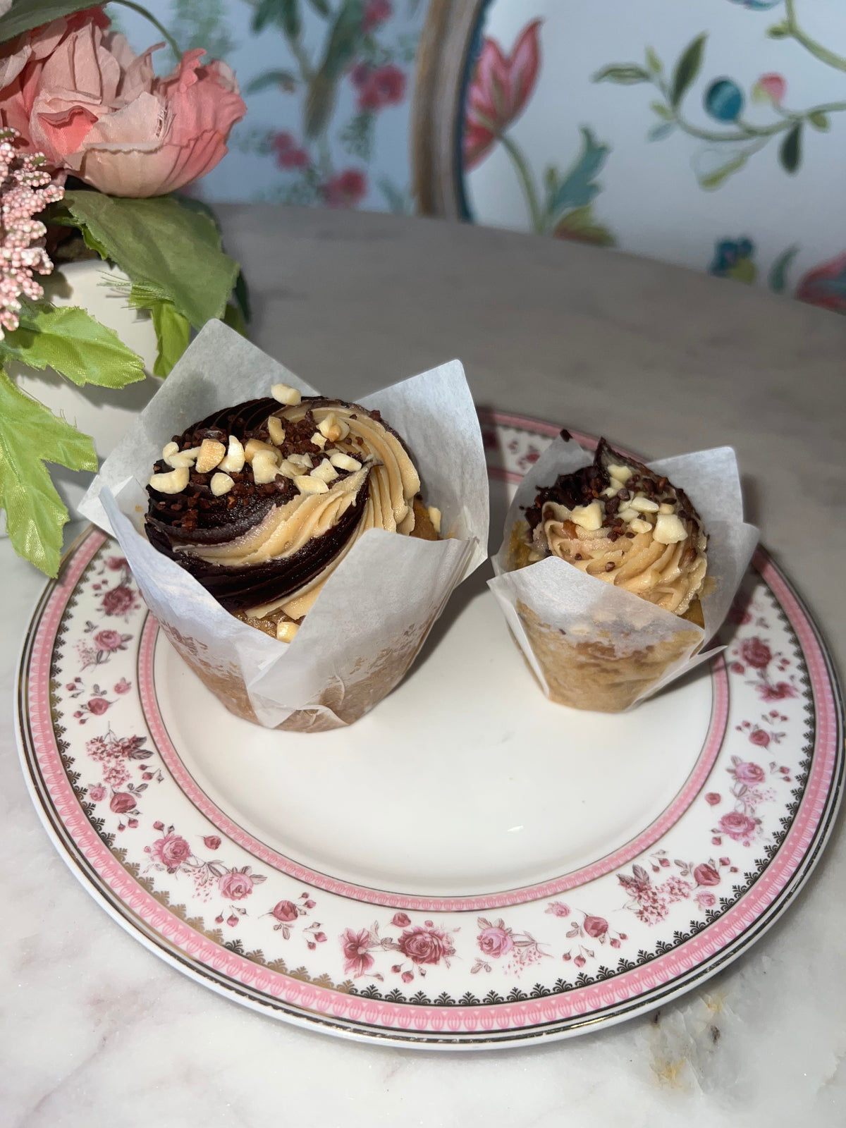 Peanut butter cupcake with chocolate peanut butter swirl icing