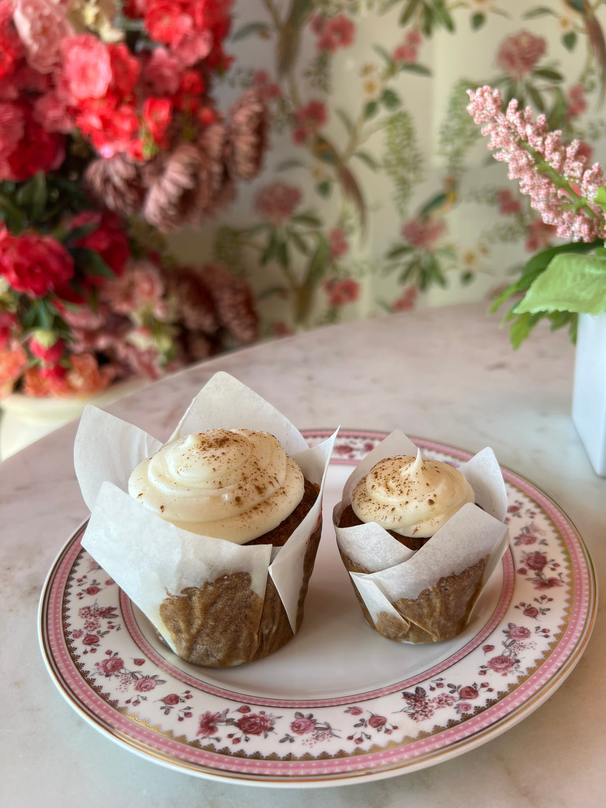 Carrot cupcake with pecans and cream cheese icing